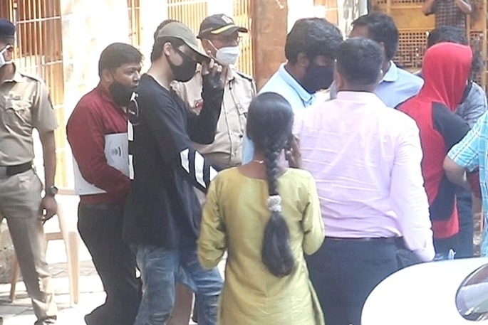 SRK's son Aryan held for consuming, buying, selling drugs