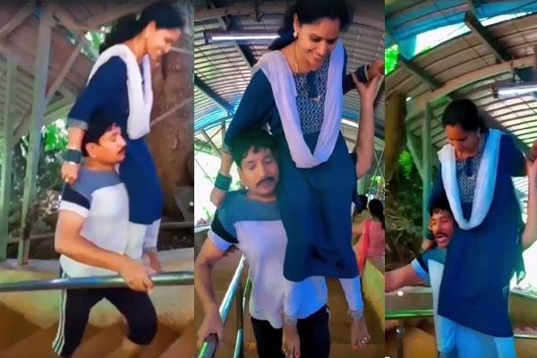 Man climbs Tirumala steps carrying wife on shoulders