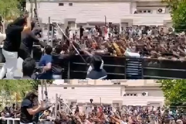 Cheering fans throng Allu Arjun's home on b'day, 'Pushpa' star waves at them