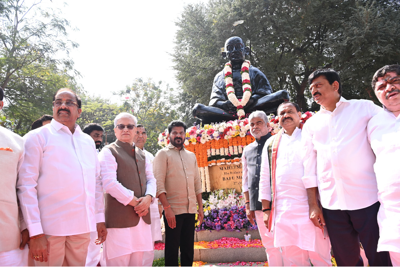 Telangana Guv, CM Reddy pay tributes to Mahatma Gandhi at Bapu Ghat