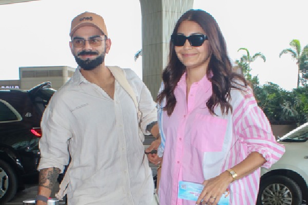 A day after quitting Test cricket, Virat visits Vrindavan with his wife Anushka