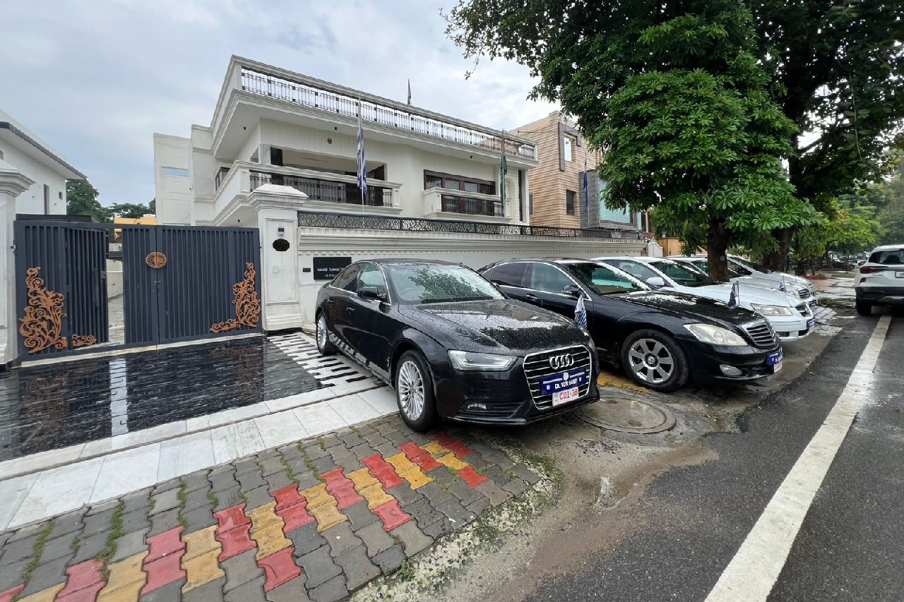 Fake embassy of fictional nations busted in Ghaziabad; Luxury cars, diplomatic gear seized
