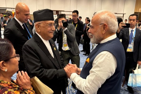 PM Modi meets Nepal's counterpart Oli, calls ties 'deep-rooted, special'