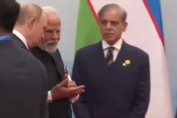 As PM Modi, Putin walk past happily, Shehbaz Sharif seen alone in a corner
