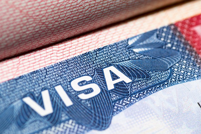 US tech firms urge H-1B visa workers to return before Sunday deadline