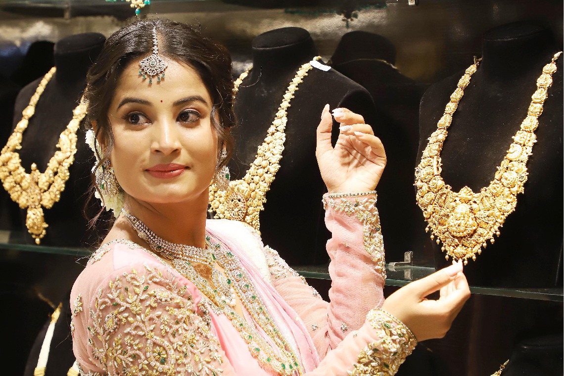 Gold, Silver prices ease on MCX amid profit booking at record highs