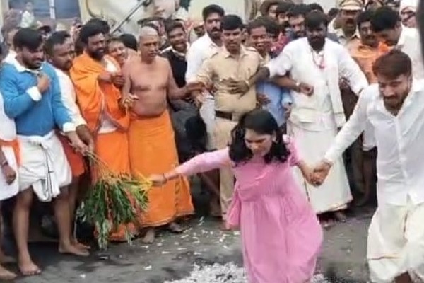 Karnataka: Deputy Commissioner takes part in fire-walking ritual at Hasanamba temple; wins hearts