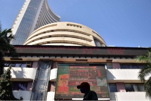 Sensex, Nifty open higher amid positive global cues