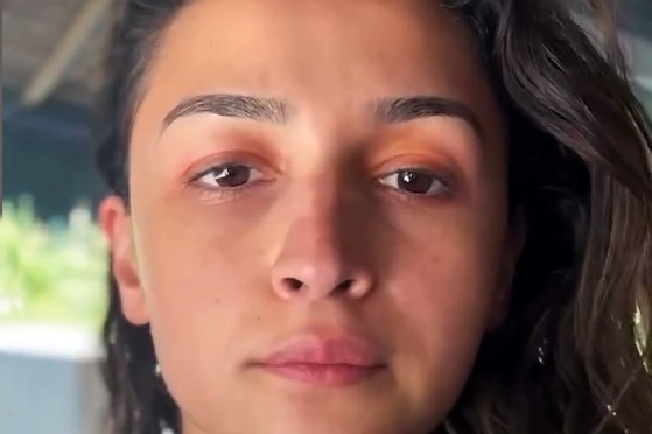 Alia Bhatt flaunts a perfect hair flip while doing her makeup