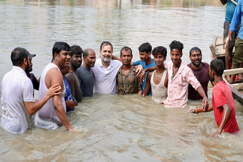 Bihar polls: Rahul joins fishermen in pond during Begusarai campaign, blasts NDA govt