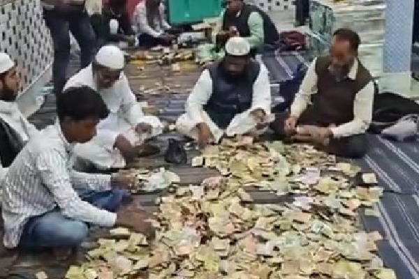 Foreign currencies, including dollar and Saudi riyal, pour into donation boxes for Kabir’s proposed Babri Masjid