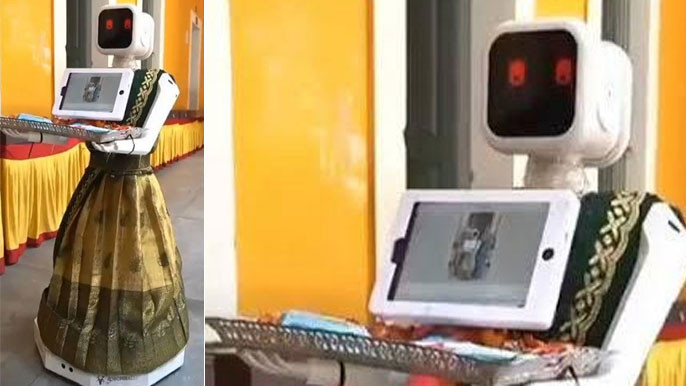 Robots welcome voters at Vellore polling booths add tech twist to voting