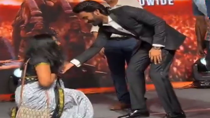 Dhanush Reacts to Female Fan Kneeling at Kara Event