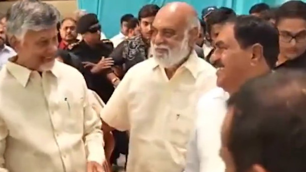 Chandrababu Naidu Taps Errabelli Dayakar Raos Shoulder at Event
