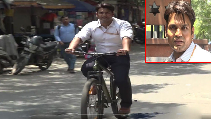 Narendra Yadav Responds to Modis Call Swaps Luxury Car for Bicycle