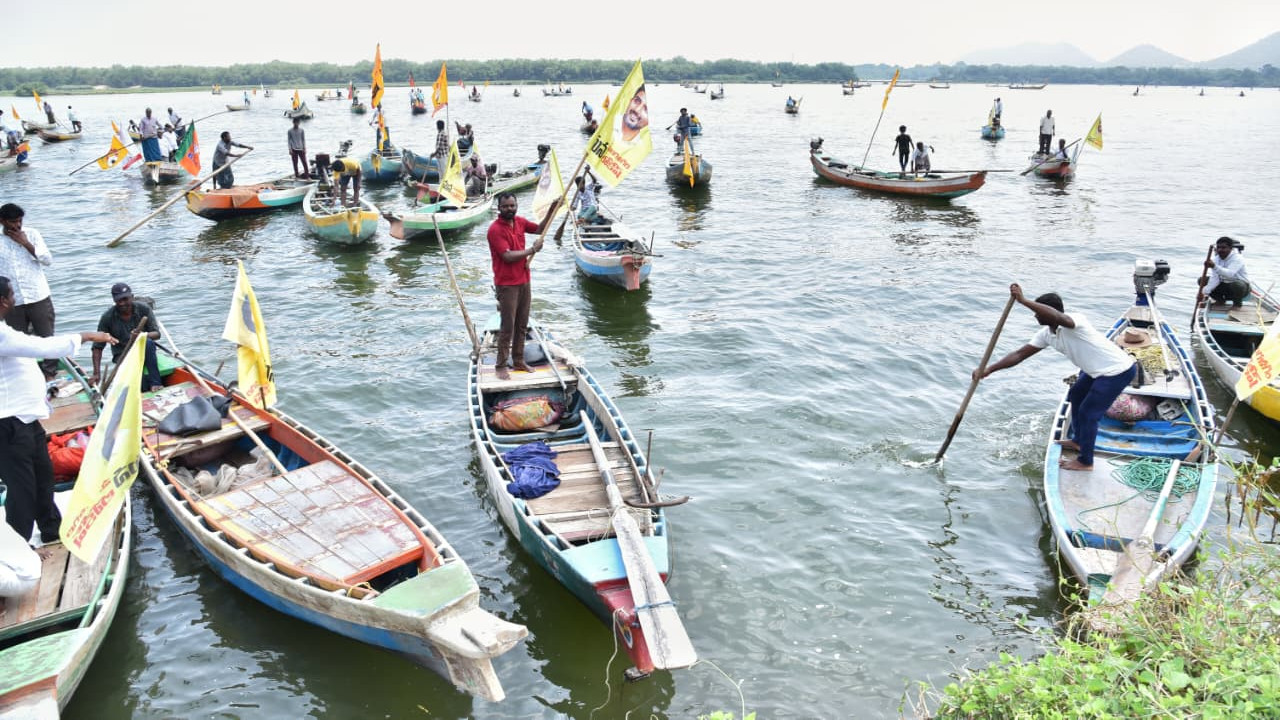 Nara Lokesh Welcomes Fishermen on 100 Boats at Krishna River