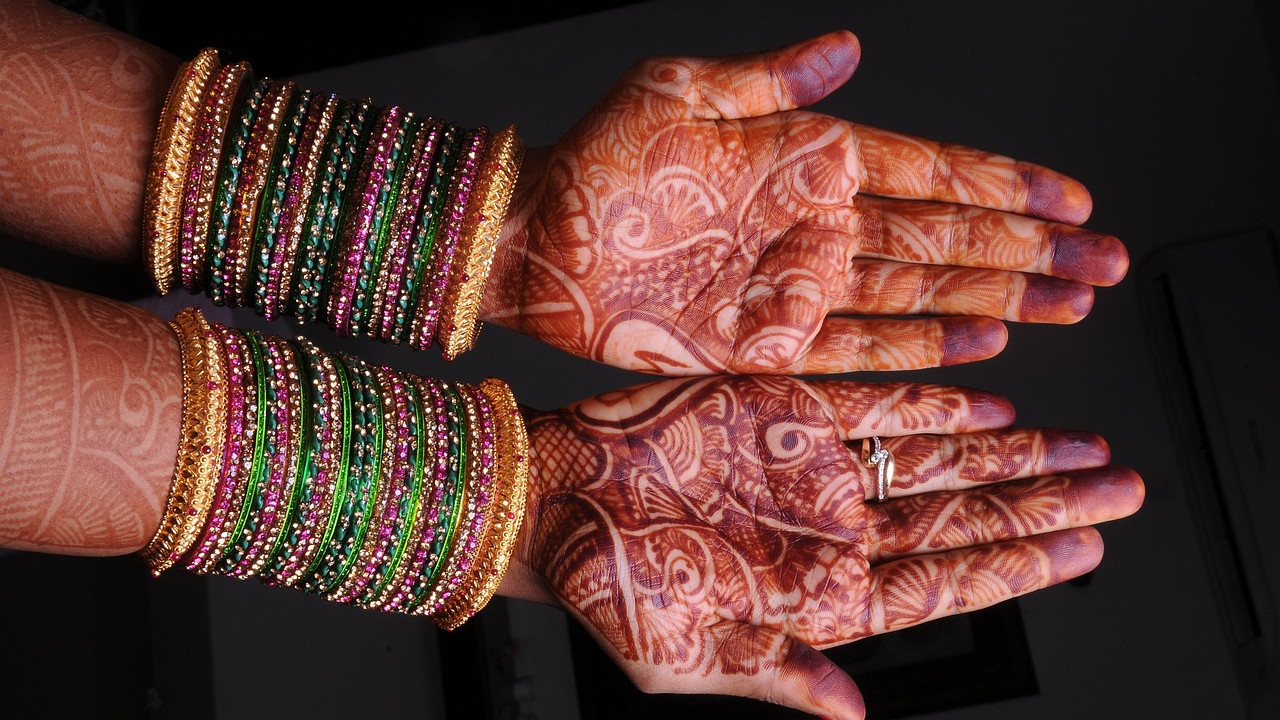 Bangles a Beauty Adornment in Womens Hands A New Trend