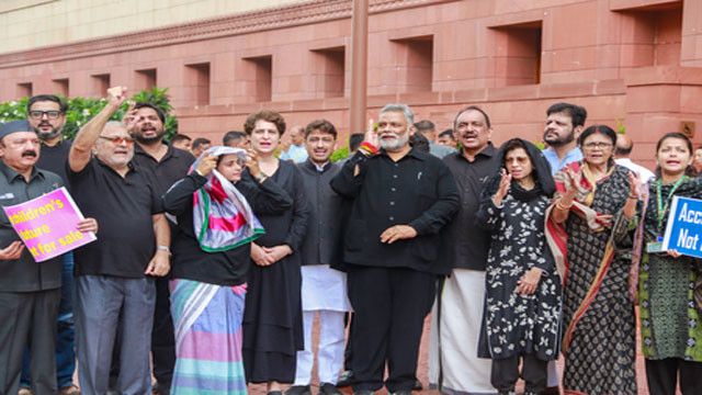 Opposition MPs wear black to Parliament over police high handedness