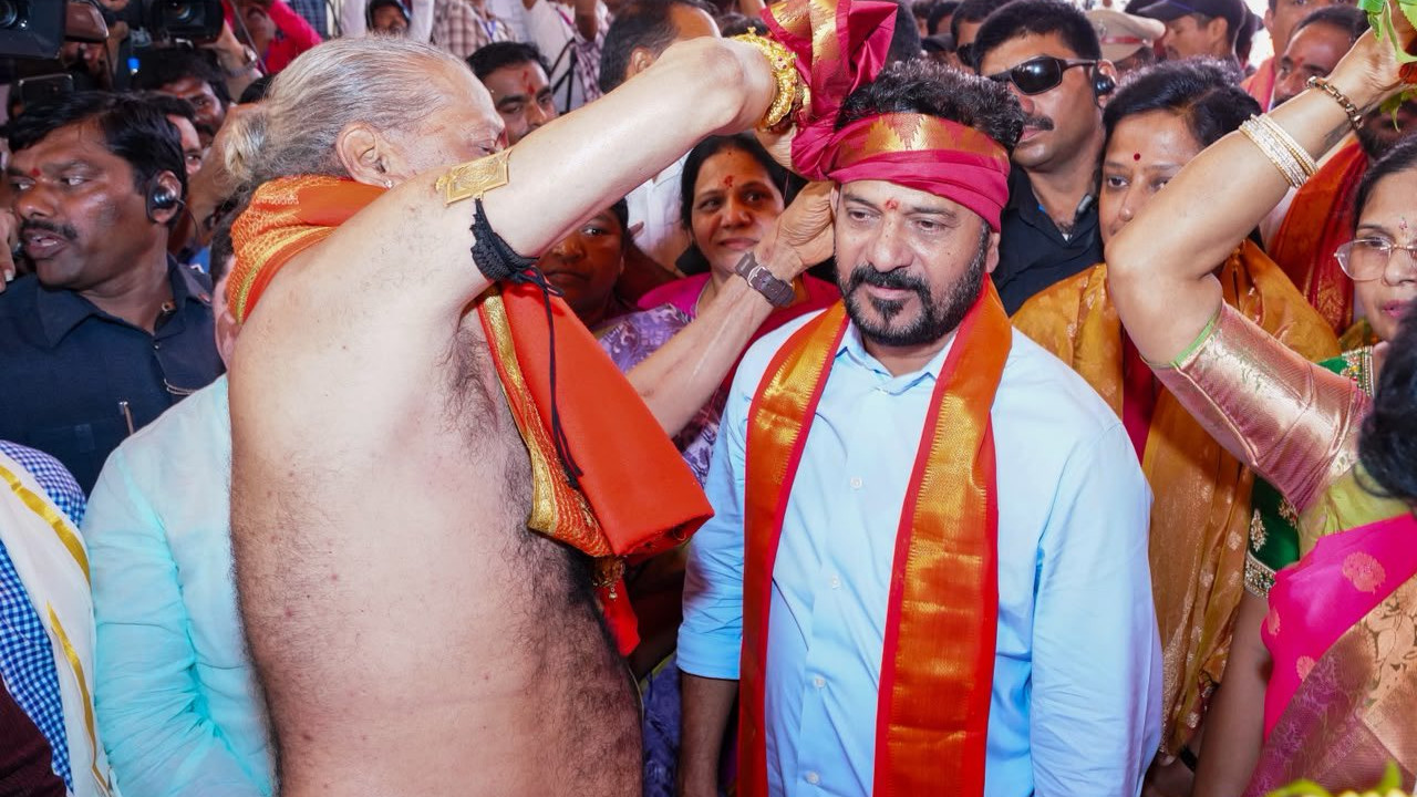 CM Revanth Reddy at Lashkar Bonalu offers silk clothes to Mahankali Ammavaru
