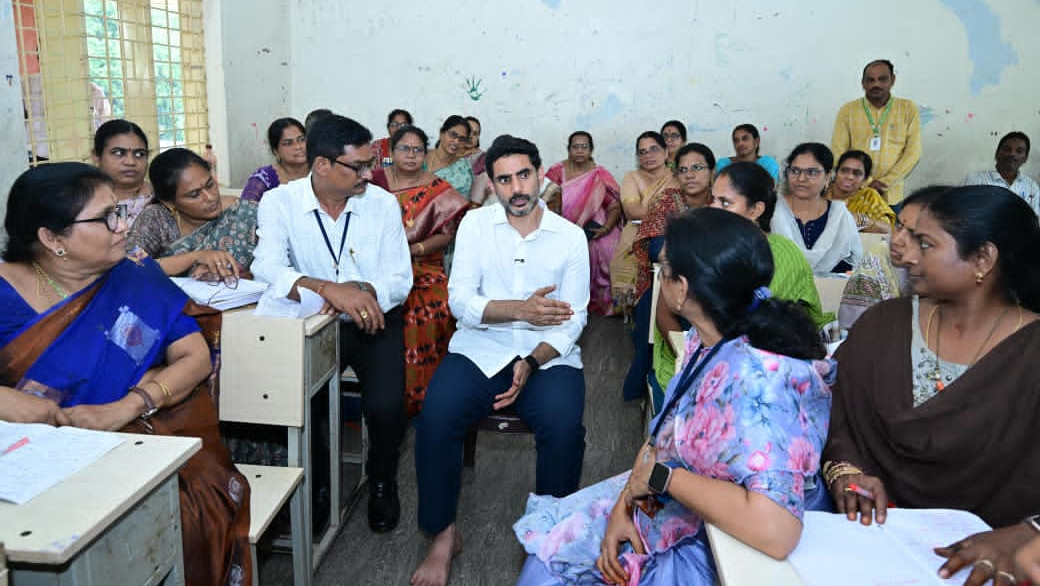 Nara Lokesh interacts with students and teachers as one among them