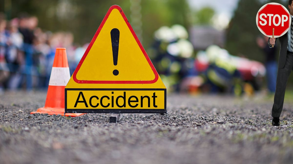 Kodada road accident private bus hits parked container six killed