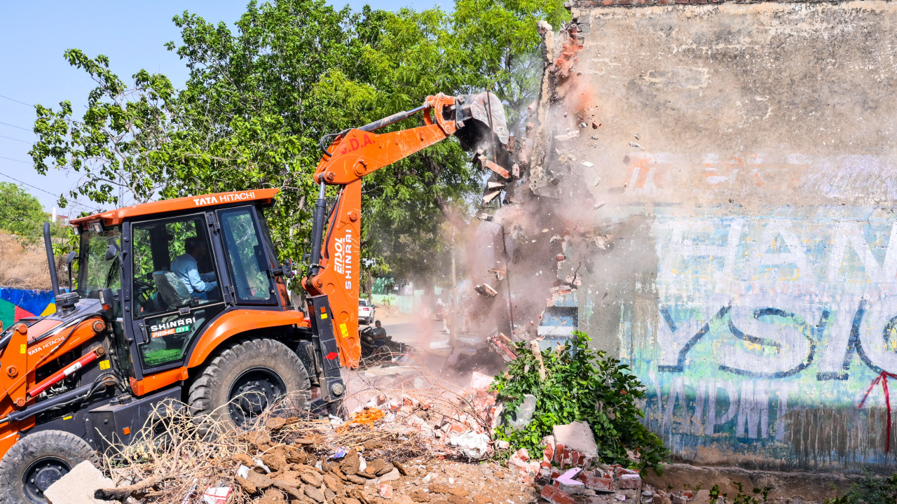 HMDA demolishes 60 acre illegal layout in Janwada