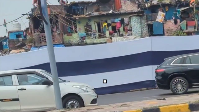 Modi failures covered with curtains on Delhi slums says Congress