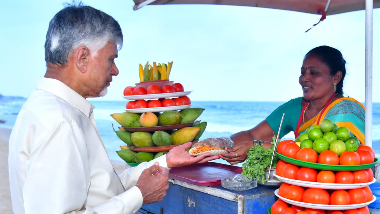 Chandrababu tastes masala mixture at Vizag beach and grants pension to lone woman on the spot