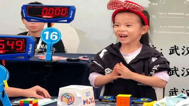 Six year old Chinese girl creates Rubiks Cube world record