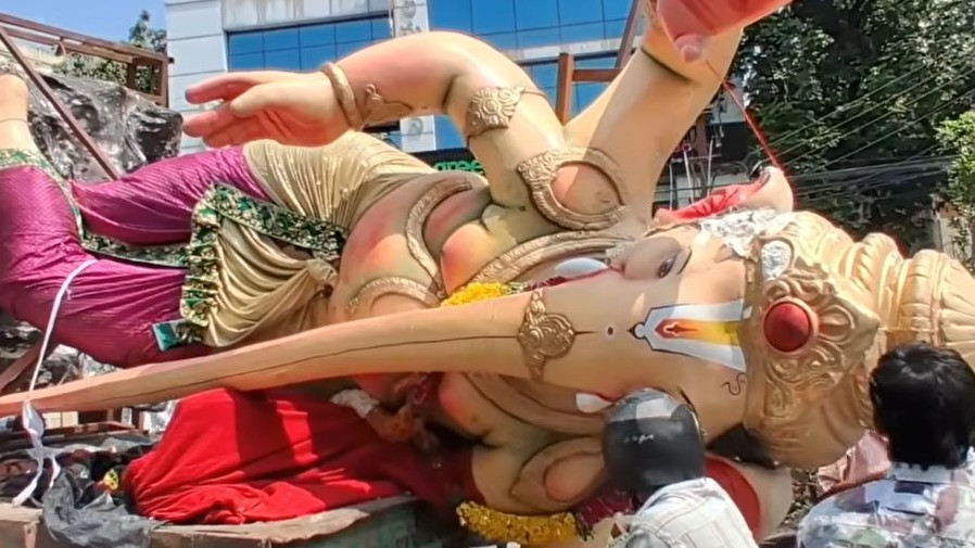 Hyderabad Ganesh idol laid flat for immersion process in Golnaka
