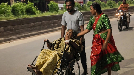 Young man takes mother on wheelchair to MLA house over hospital negligence