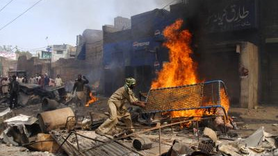 Another atrocity in Pakistan Christian house and shop set on fire 35 families migrate