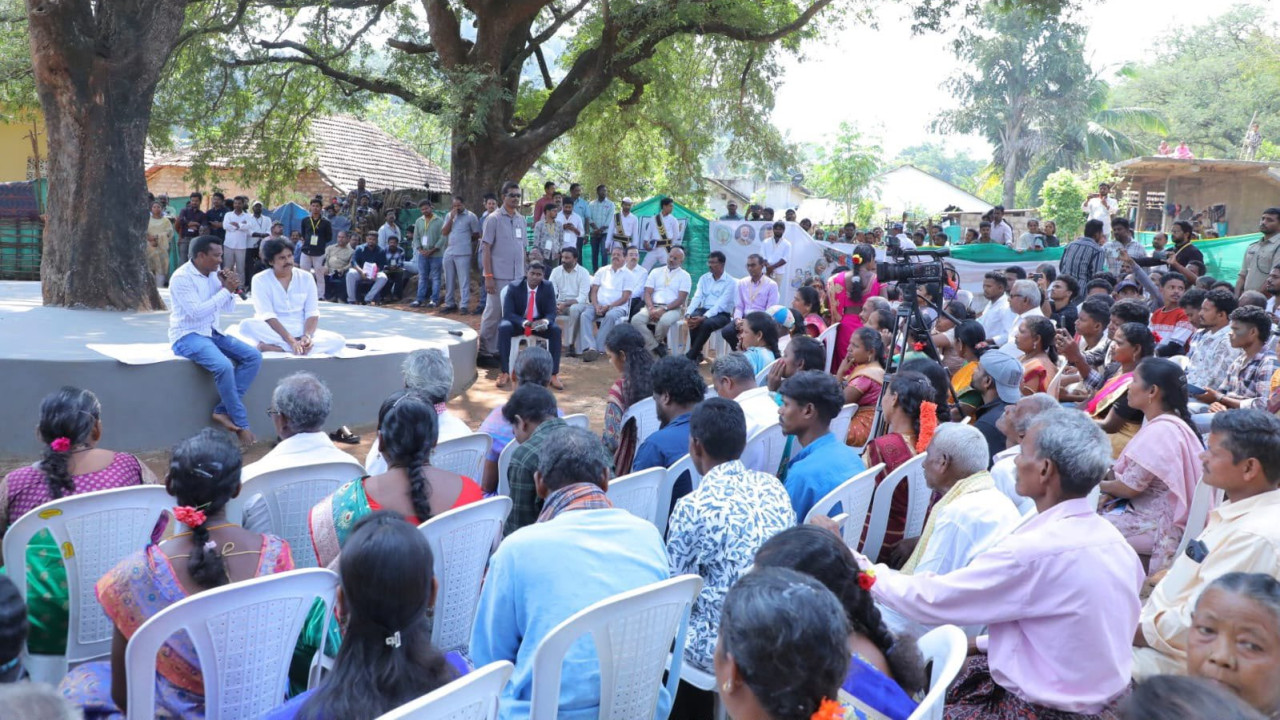 Pawan Kalyan interacts with tribals sitting under a tamarind tree
