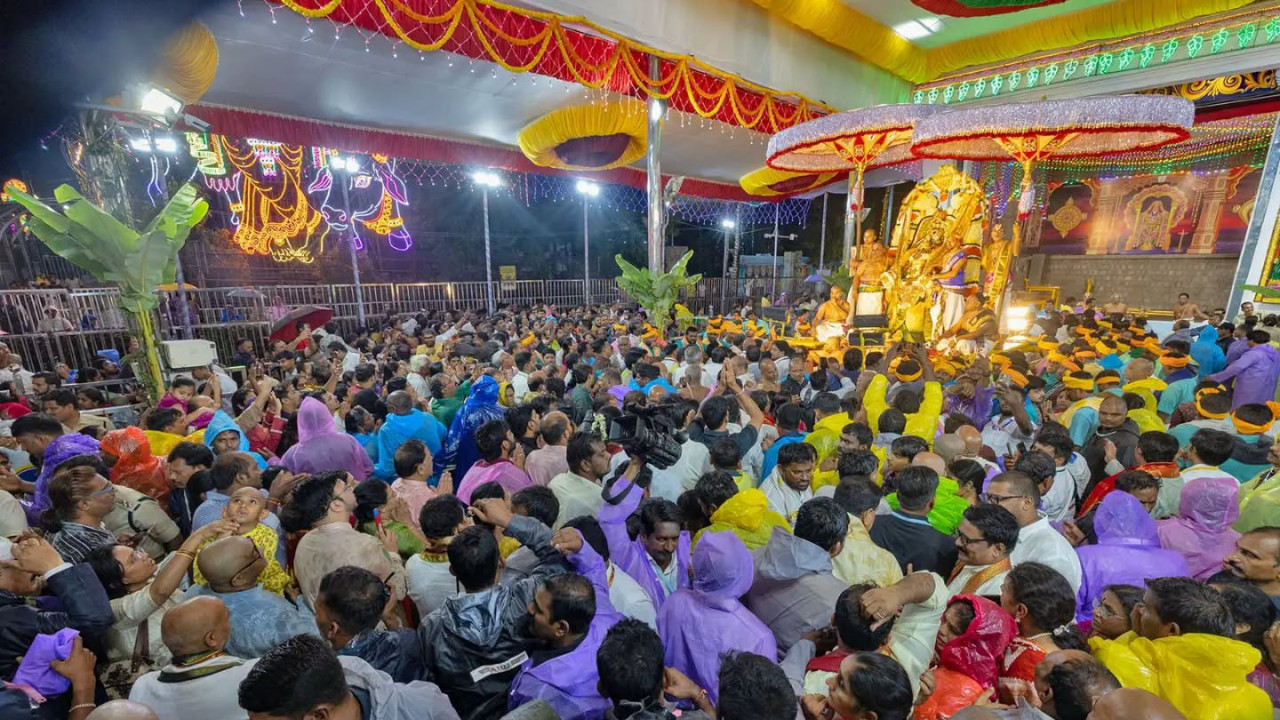 Lord Venkateswara Garuda Seva celebrated grandly in Tirumala despite heavy rain