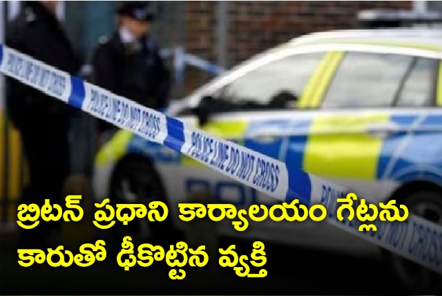 Man arrested after crashing car into britains pm official residence 