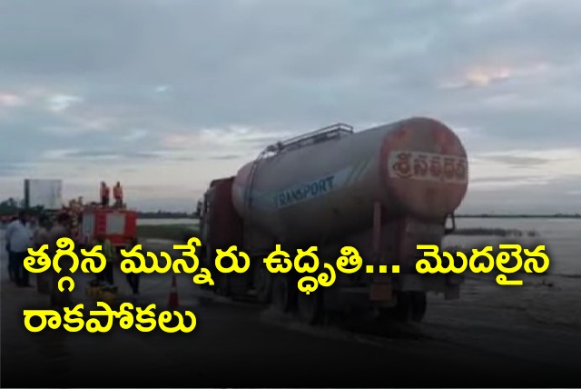 Vehicles moves as Munneru slow down at Aitavaram on Vijayawada and Hyderabad highway 