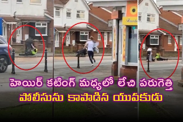 man runs midway through haircut to help policeman under attack
