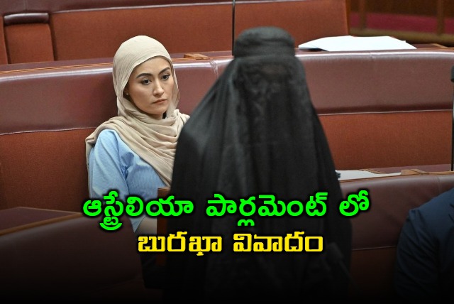 Australian Senator Pauline Hanson Suspended for Burqa Stunt