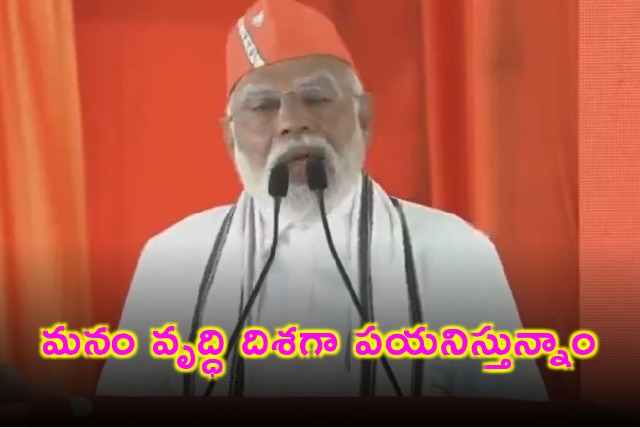 Narendra Modi says India is growing amid global slowdown