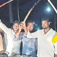 Youngsters with swords during birthday celebrations in Mummidivaram