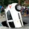 Huge sink hole on Delhi road swallowed a big car