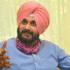 Navjot Singh Sidhu mimics a batting style