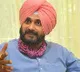 Navjot Singh Sidhu mimics a batting style