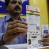 AP postal Department linking mobile number with Aadhar at door step