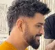 Dhoni in new hair style