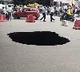 Heavy Pit Hole Middle Of The Road Under Fly Over