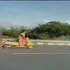Woman worker adventures on scooter while Devineni Uma traveling