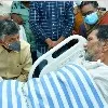Chandrababu meets TDP follower in hospital