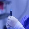 US cities mandate vaccination proof for indoor activities