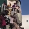 Image shows Afghans crammed in US cargo plane